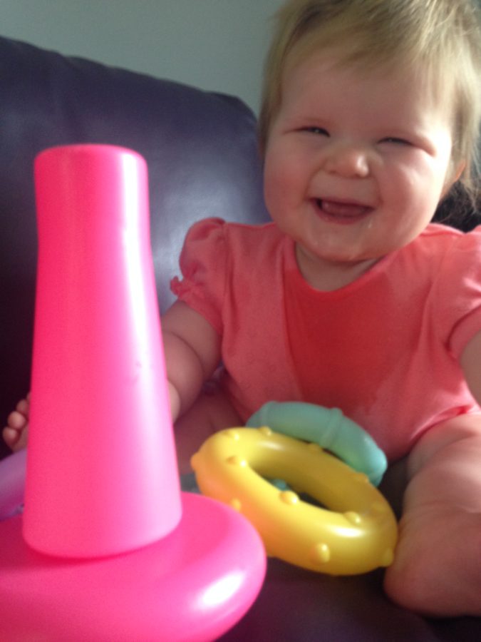 Baby with stacking toy